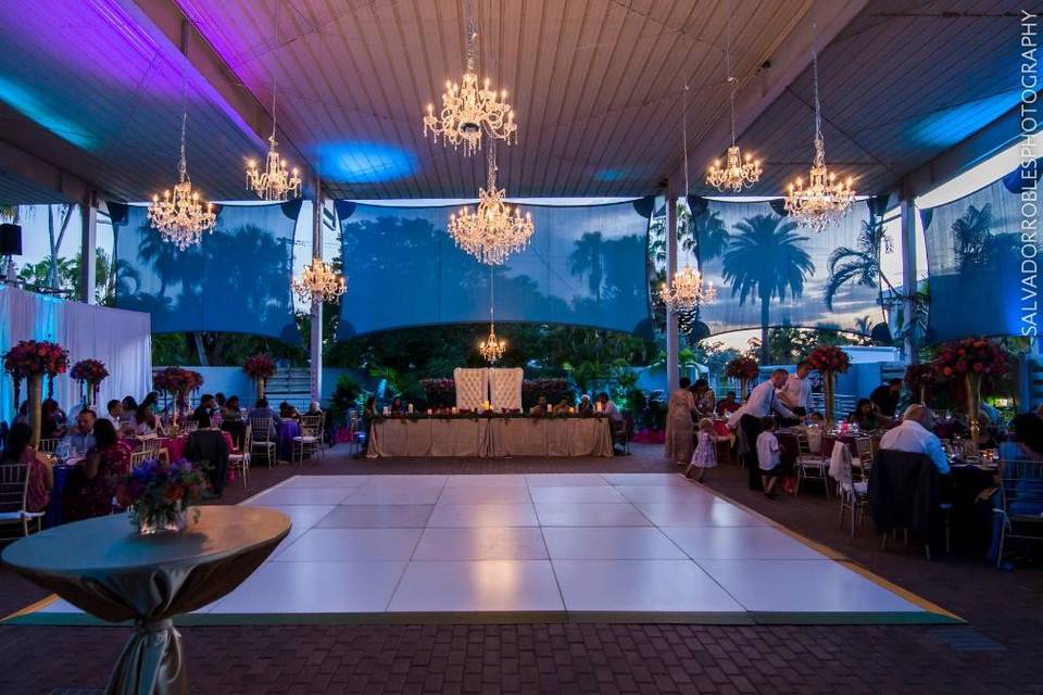 beautiful   itoryndian wedding chandeliers hanging on dance floor make a romantic look at Mote Marine laboratory