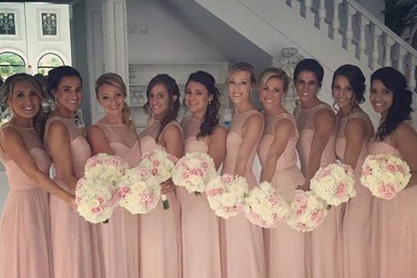 High neck bridesmaid dresses in blush by Amsale Bridesmaids