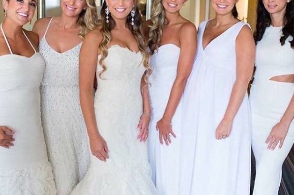 Loving bridesmaids in all white! Styled in Hayley Paige Occasions, Bari Jay and Adrianna Papell