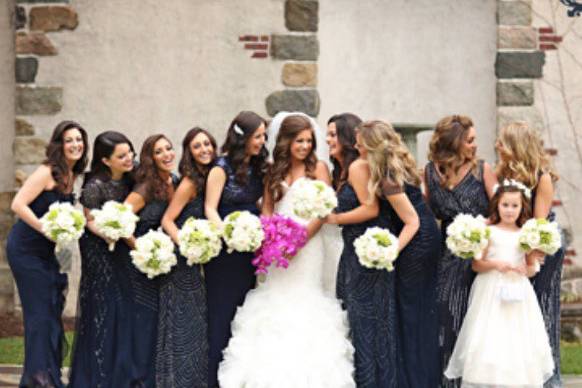 Bridesmaids styled in our Studio in navy dresses by Adrianna Papell