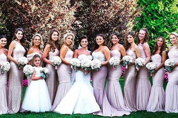 Amsale bridesmaids styled in our Studio in blush mermaid dresses!