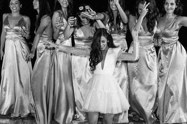 Bridesmaids wearing champagne slip dresses. Simple and understated yet perfect!