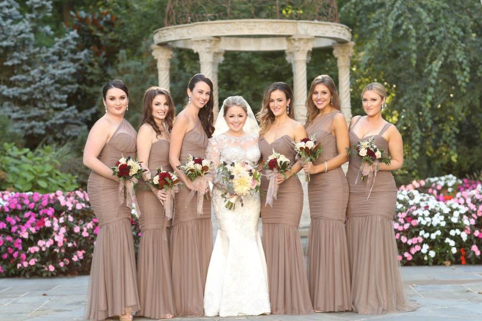 Amsale bridesmaids in mocha! A combination of strapless and one shoulder mermaid styles.