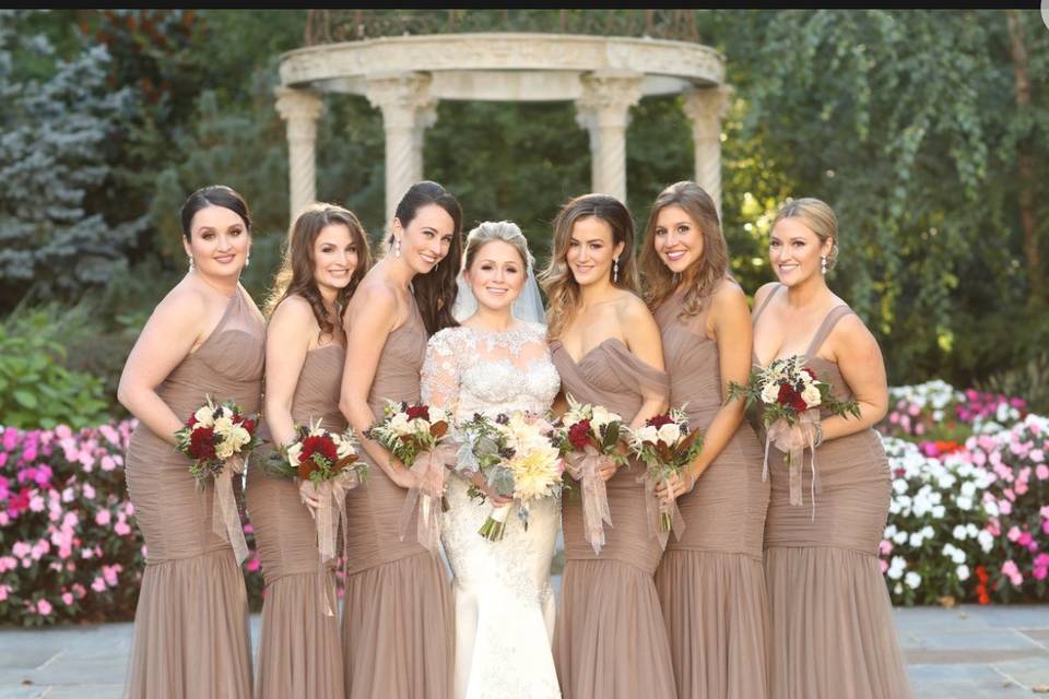 Amsale bridesmaids in mocha! A combination of strapless and one shoulder mermaid styles.