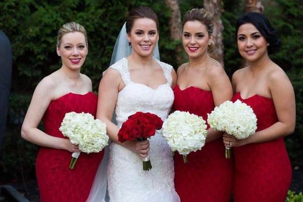 Bridesmaids styled in our Studio in a strapless red, lace mermaid dress by Portia and Scarlett.