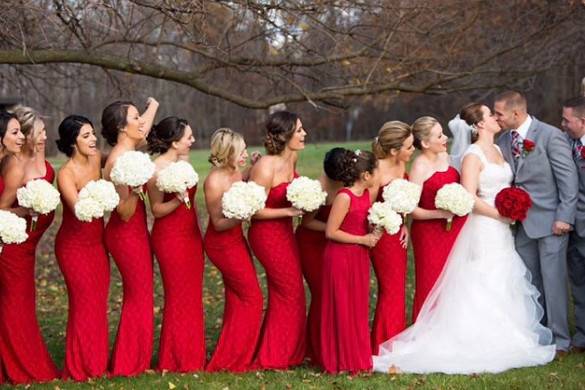 Bridesmaids styled in our Studio in a strapless red, lace mermaid dress by Portia and Scarlett.