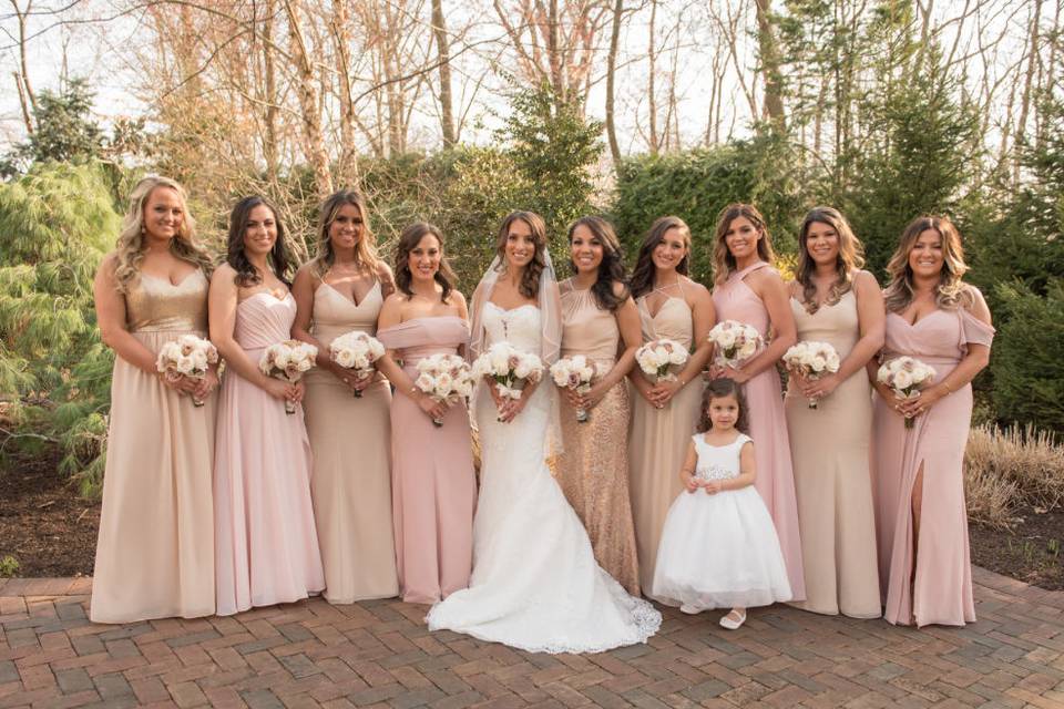 Bridesmaids styled in our Studio in a mix of fabrics and colors. Love the combination of sequin, tulle, and shades of pink.