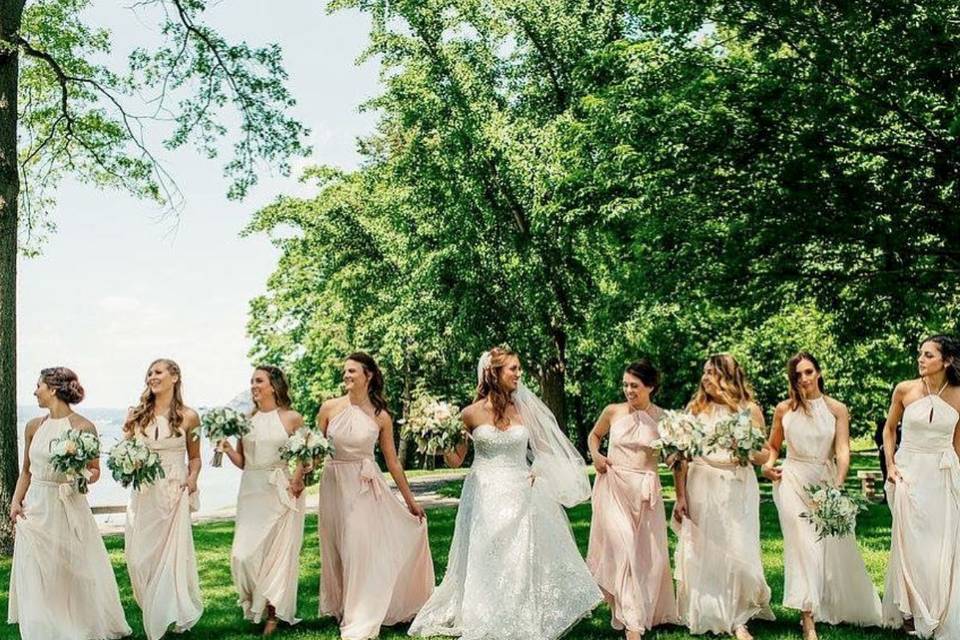 Bridesmaids styled in Amsale Bridesmaids! Different styles and shades of pink create a one of a kind look for your bridal party.
