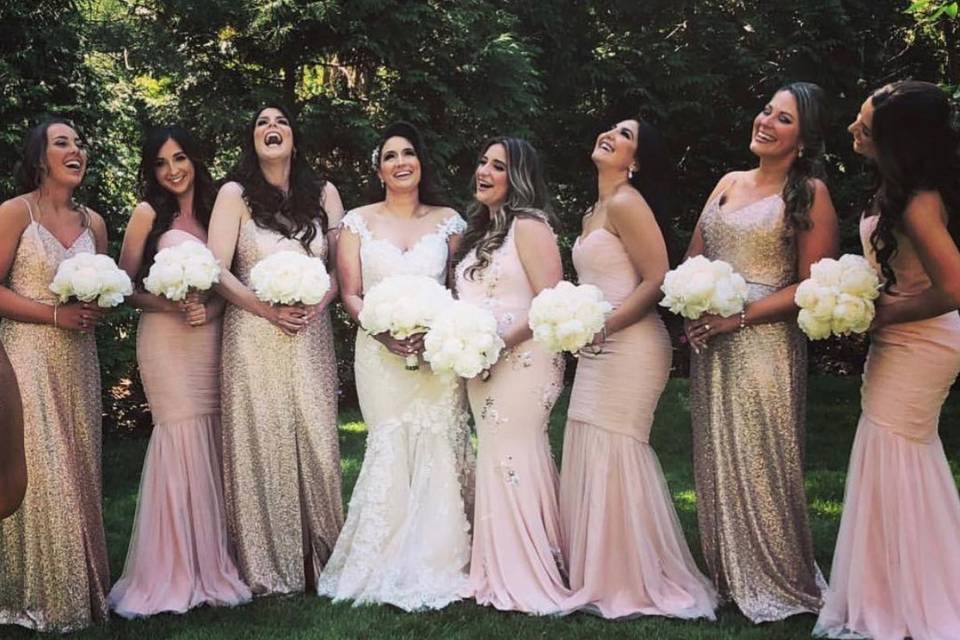 A combination of rose gold sequin and blush tulle for these bridesmaids! The maid of honor was styled in a blush dress with floral beading by Jovani.