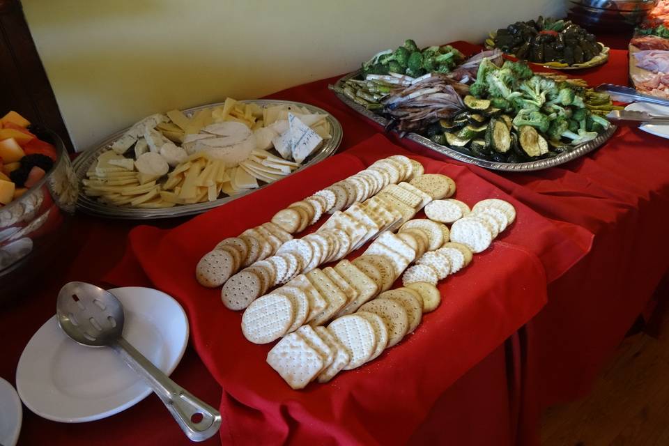 Cheese platter, crackers and grilled vegetables