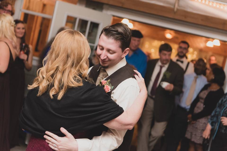 Groom dances with mom