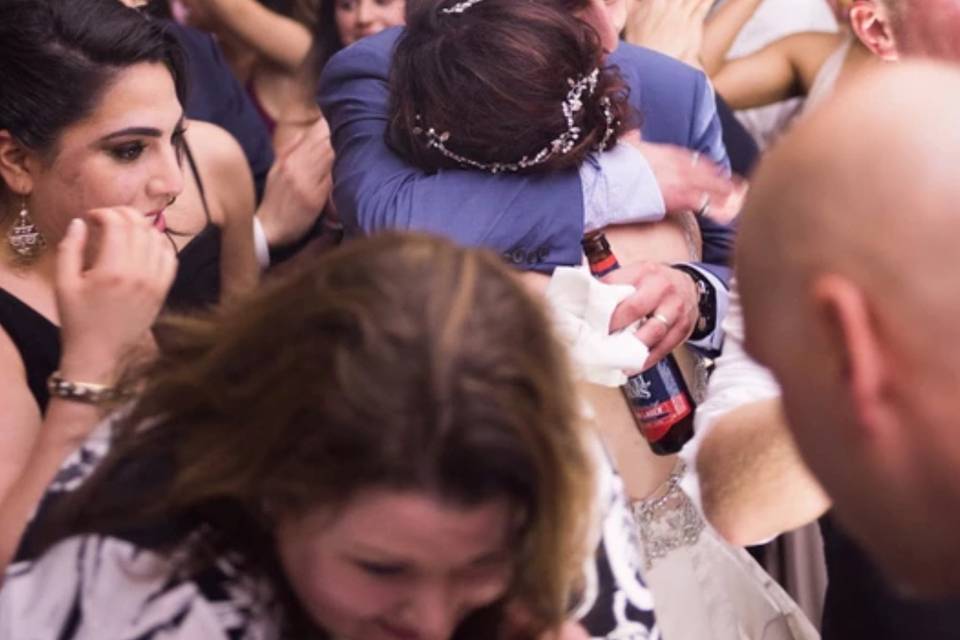 Bride and groom embrace