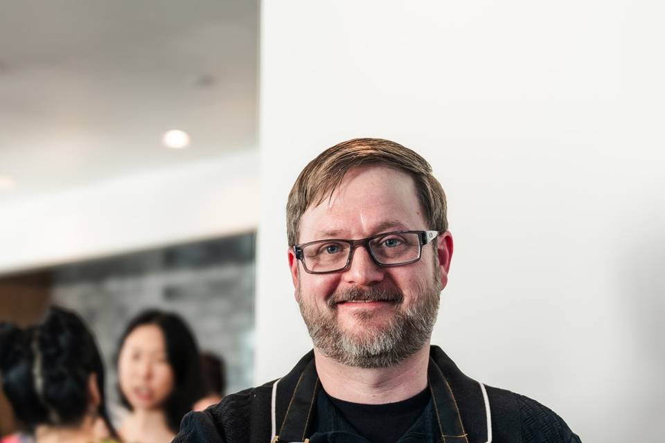 Barista serving iced coffee