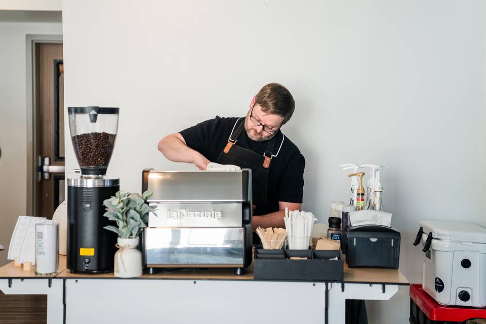 Barista pouring latte art