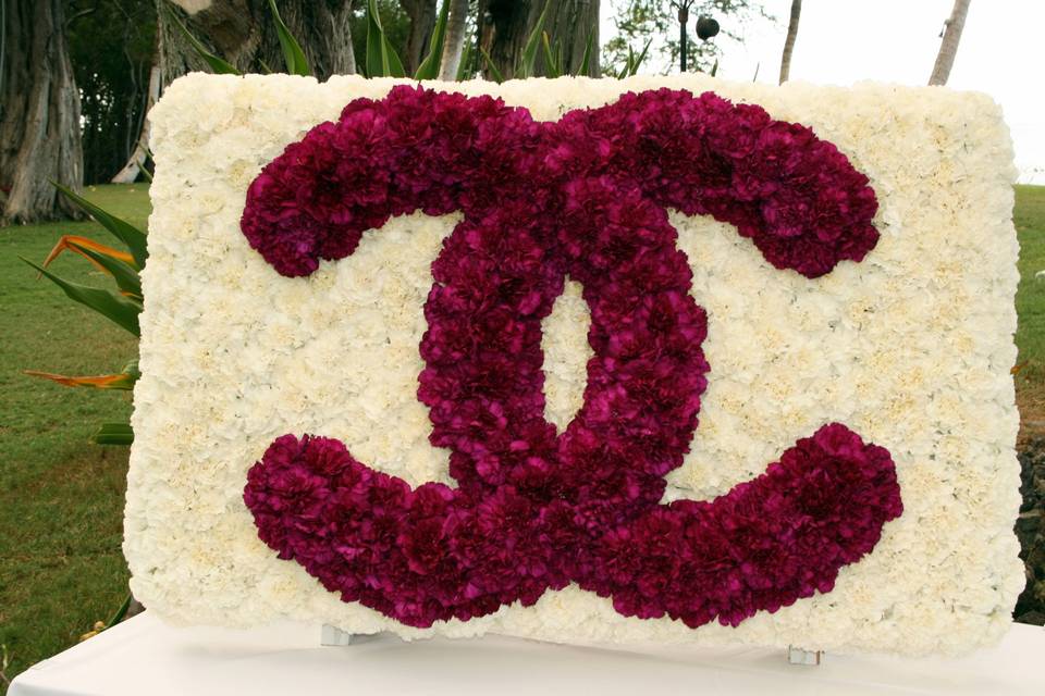 A Custom Monogram in live flowers to Accessorize the dance floor