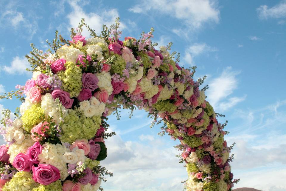 A Floral Arch of Hydrangea, Stock and Roses etc.