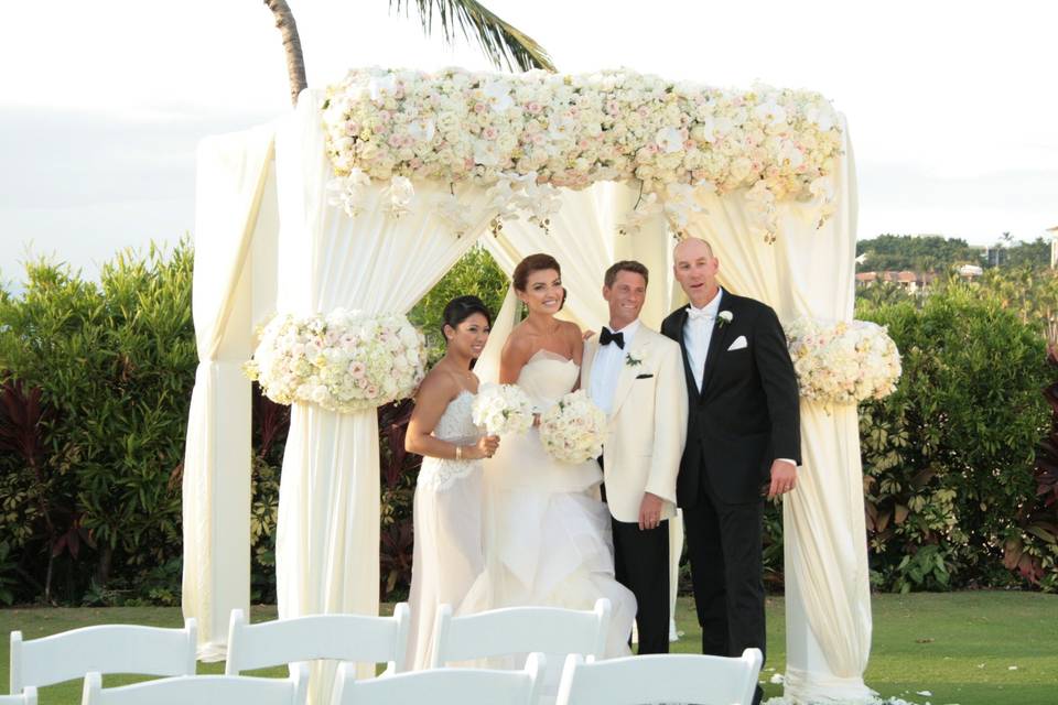 Lush floral Tiebacks highlight this lovely ceremony