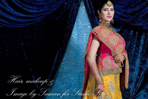 Smokey Eye in greens and golds with muted lips and large loose curls for a Mehndi/Sangeet Event at Lakeway Resort and Spa in Austin.