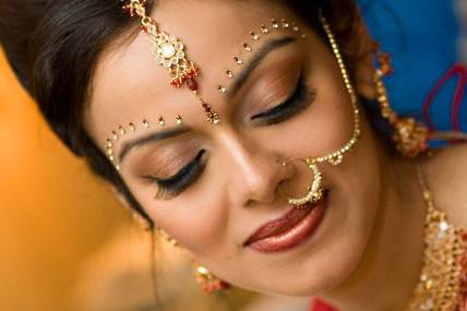 Traditional Indian wedding hair and makeup look.