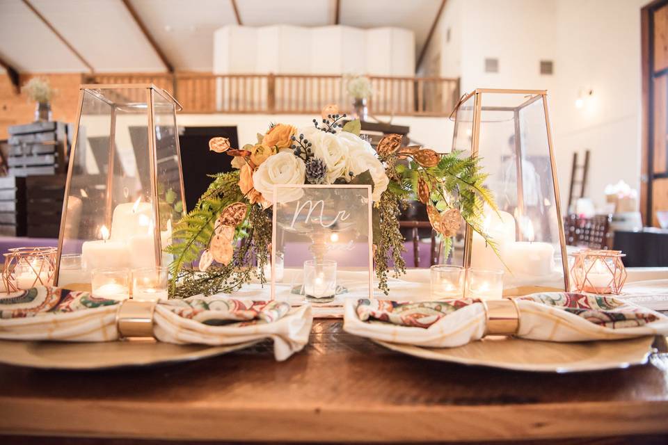 Copper lanterns and ferns