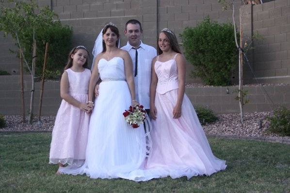 Posing for the camera with the bridesmaids.