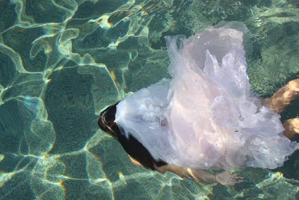 Having a swim in my bridesmaid's dress.