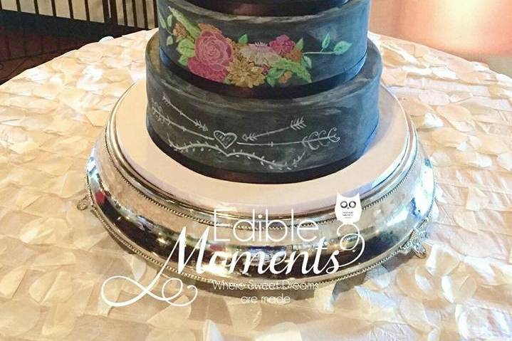 We designed a 4-tier chalk board themed wedding cake for Samantha & Trevor to coordinate with their theme & colors.