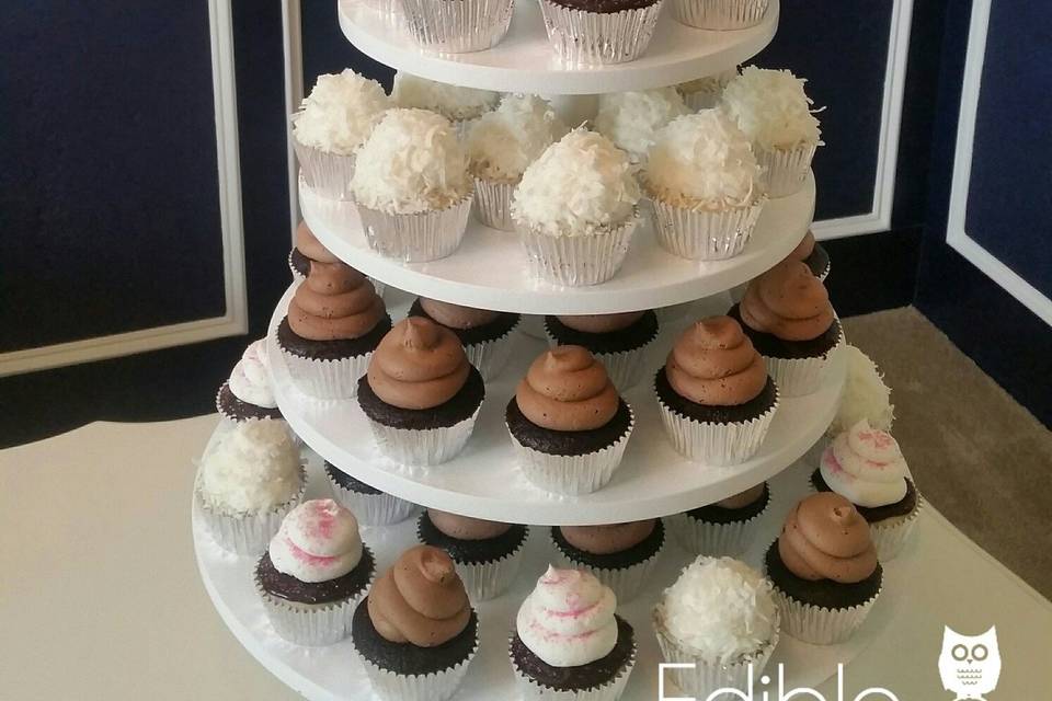 3-tier classic white wedding cake.  Ryon wanted a white tone-on-tone pearl/ivory classic look.