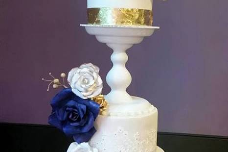 Stunning Pedestal Cake Design!  Featuring wafer paper flowers, gold leafing, and embossed stenciling.