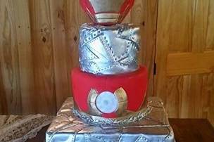 This groom celebrated his passion of cooking.  He even provided his personal cutting board to use for his cake board.