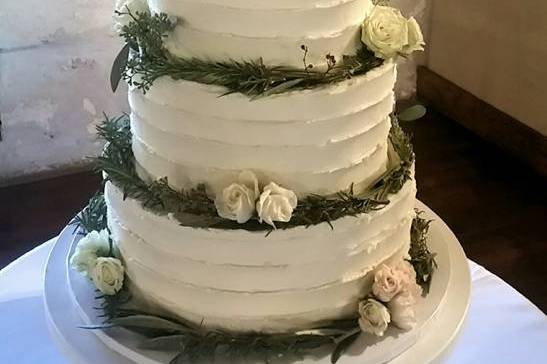 Classic Butter Cream design.  Fresh flowers.