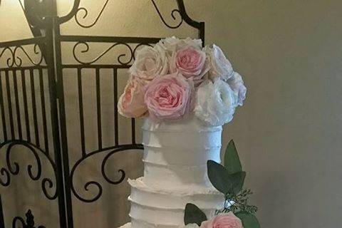 Classic Butter Cream design.  Fresh flowers.