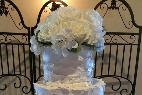 Fairy tale wedding cake.  Wafer paper flowers