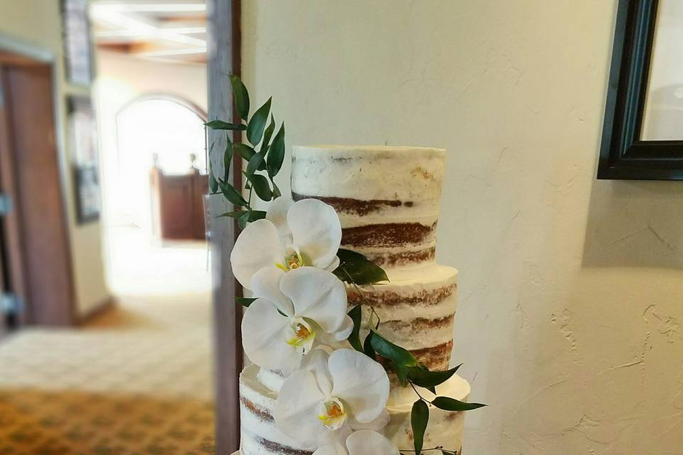 Chalk board themed wedding cake. Silver leaf band on top tier & full silver leaf on bottom tier with damask overlay pattern.