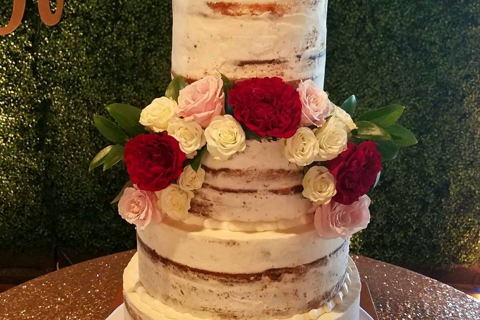 Naked Cake featuring a double barrel tier & fresh florals