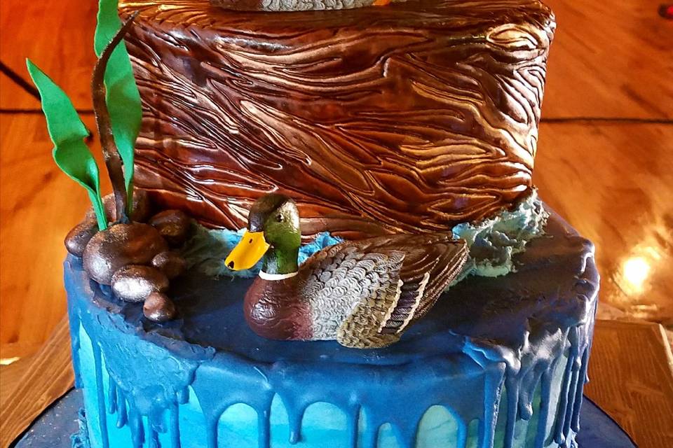 Classic Chocolate Butter Cream Groom's Cake with A&M logo with chocolate covered strawberries