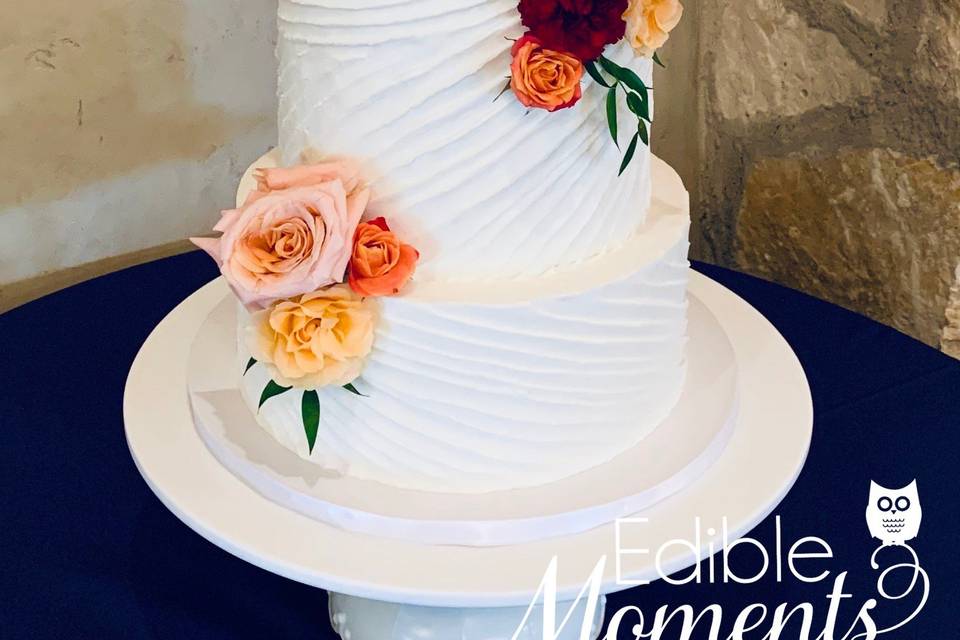 Naked Wedding Cake Design with fresh florals