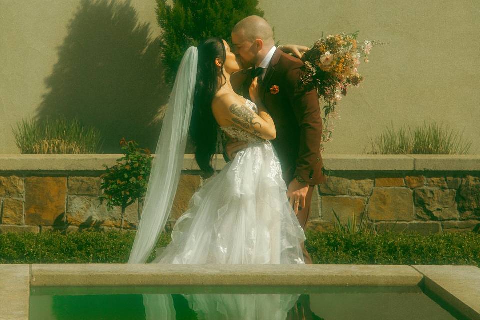 Bride & groom kiss