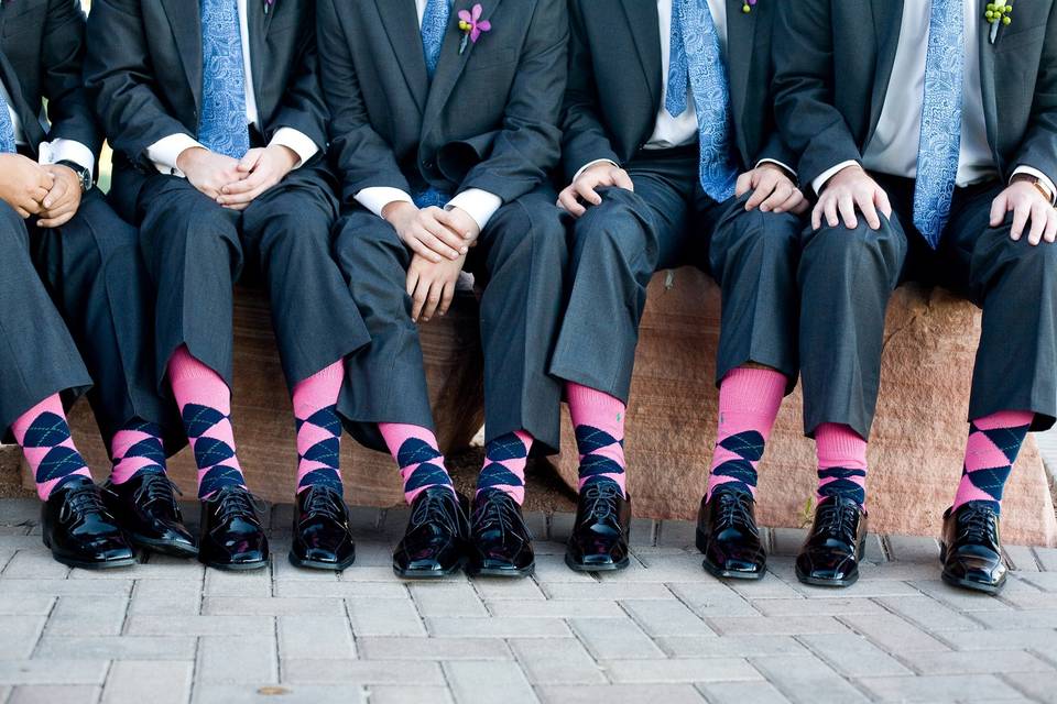 We carry cool fun socks in solid colors and patterns to accessorize the men and make them feel fun and great in their formal wear!