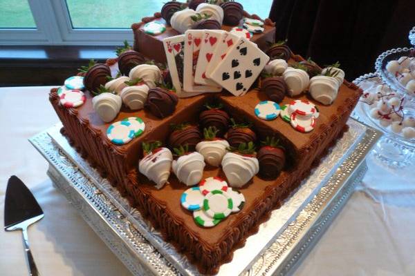 buttecream cake with edible cards and chips