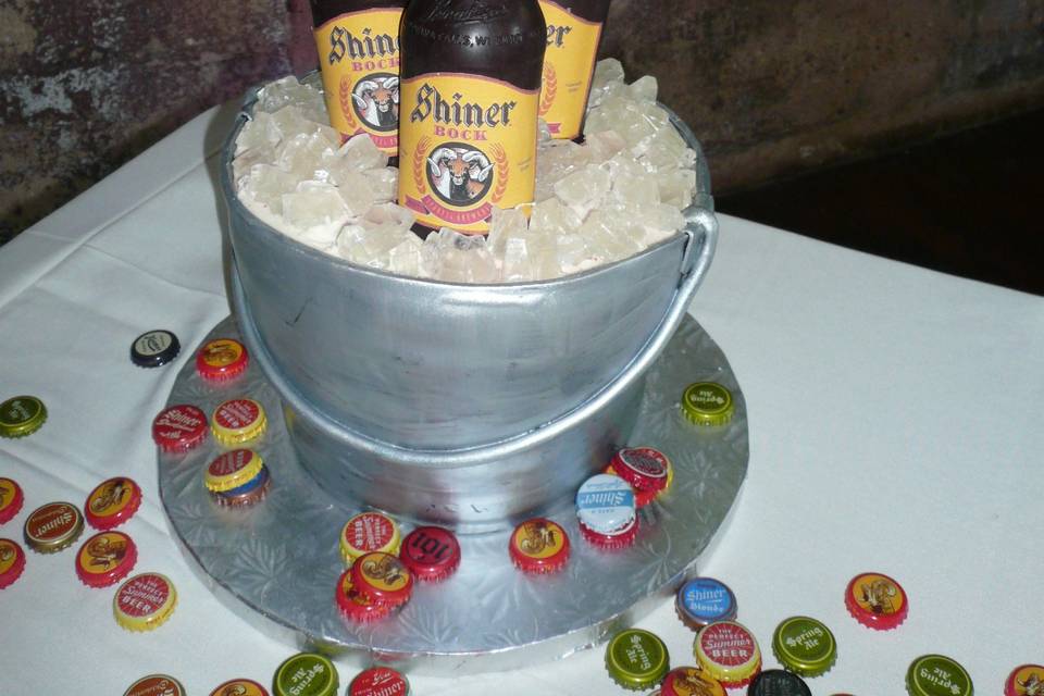 buttecream cake with edible cards and chips