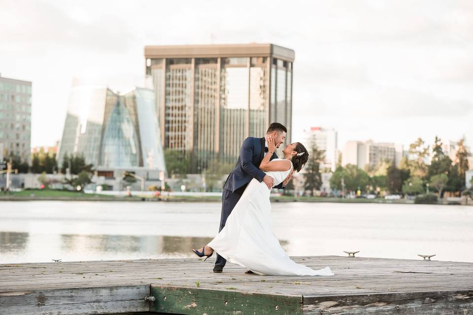 Couple dancing by a pond