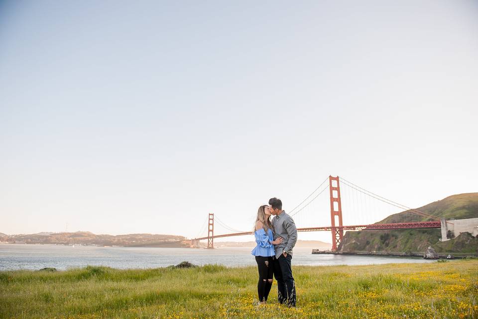 Couple in front of Golden Gate Bridge