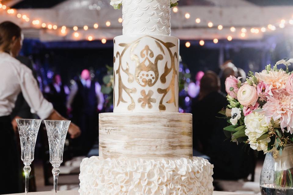 Textured cake with gold engravings