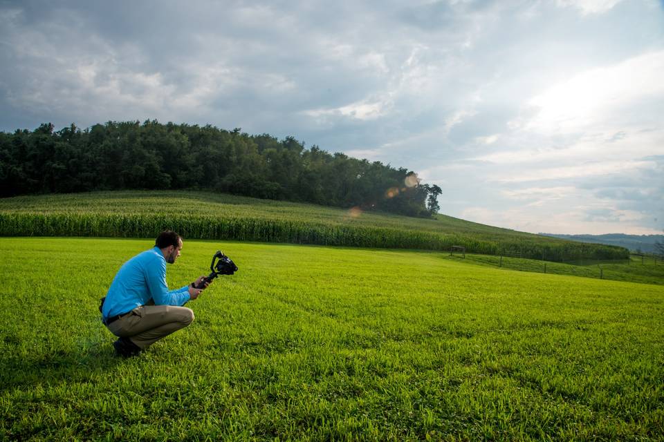 Zach filming a wedding