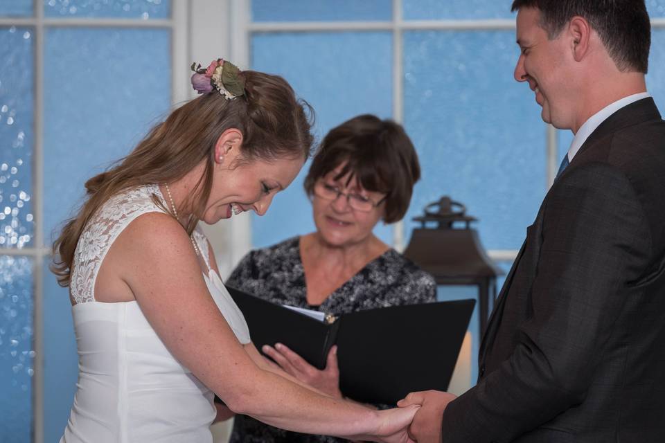 The officiant with the newlyweds