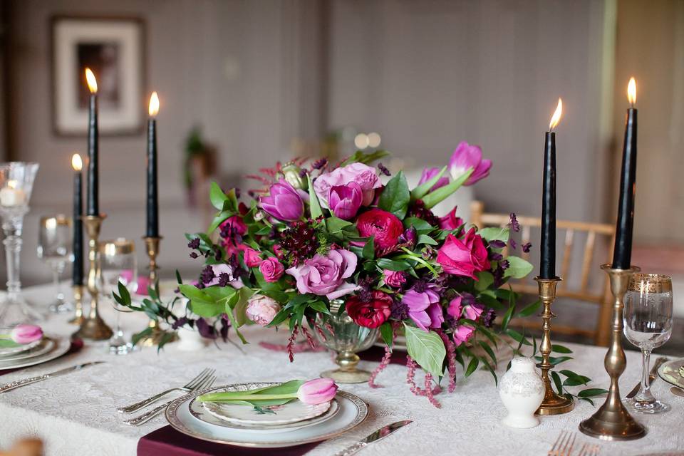 Floral table centerpiece and candle lights