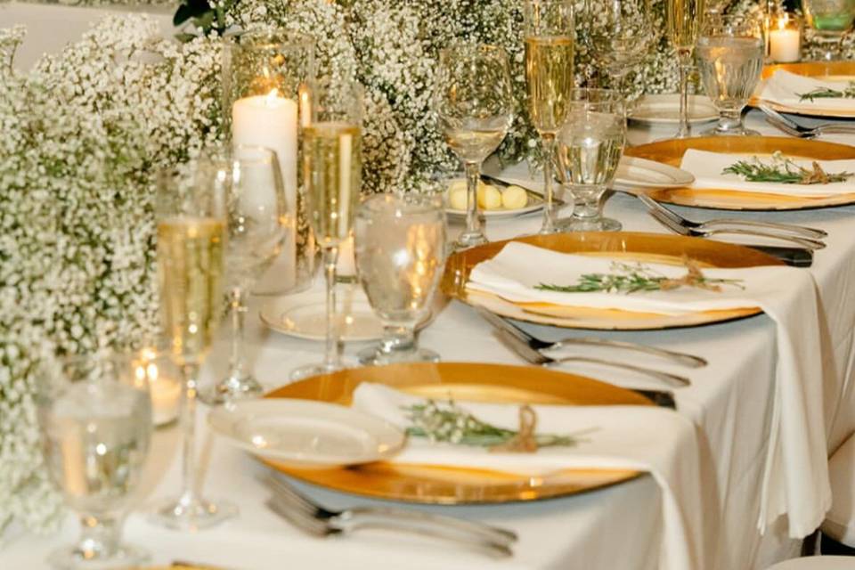 Flowers on bridal party table