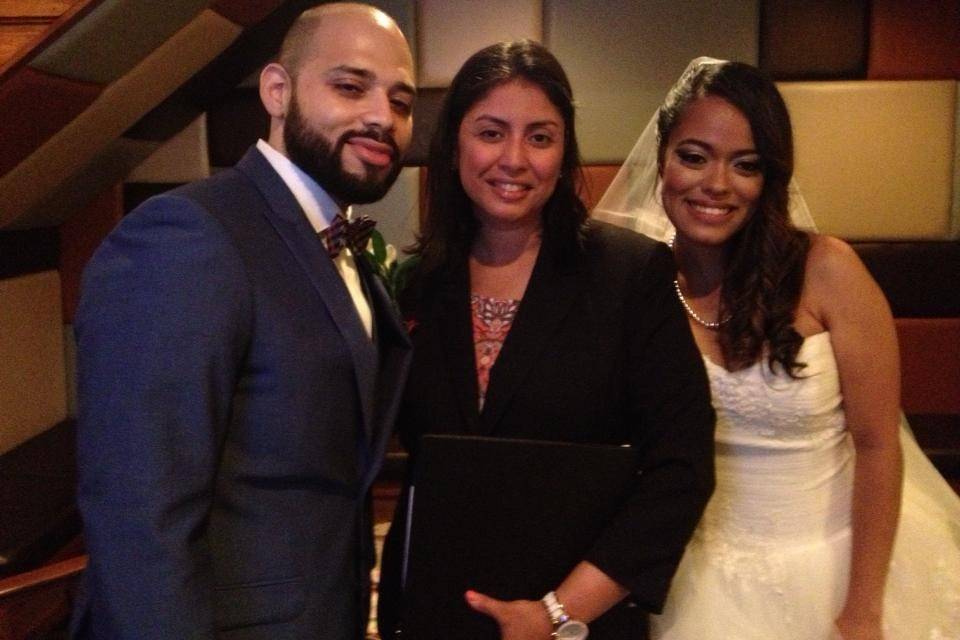 Groom, officiant, and bride