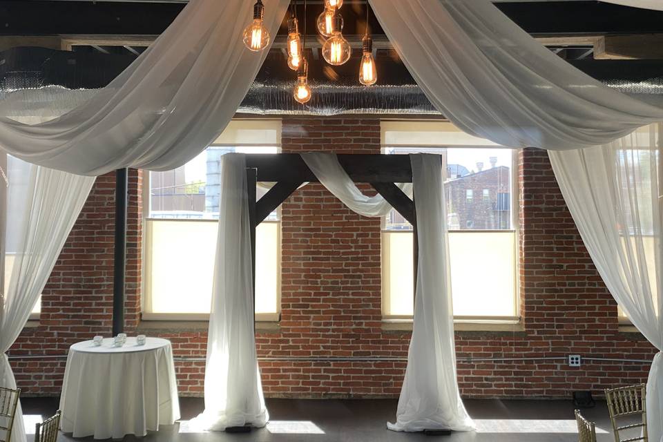 Arch with draping fabric